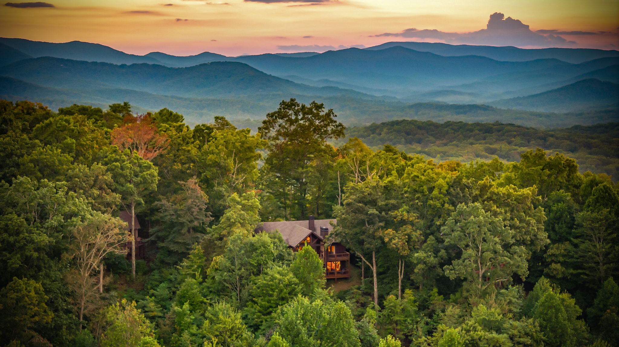 Aerial view of Eversky on Sunrock with Blue Ridge Mountains at sunset