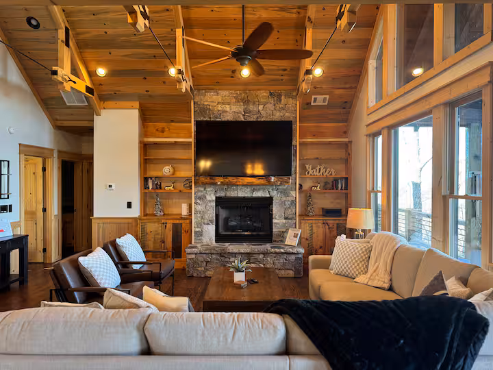 Outdoor fire pit with Adirondack chairs and mountain views