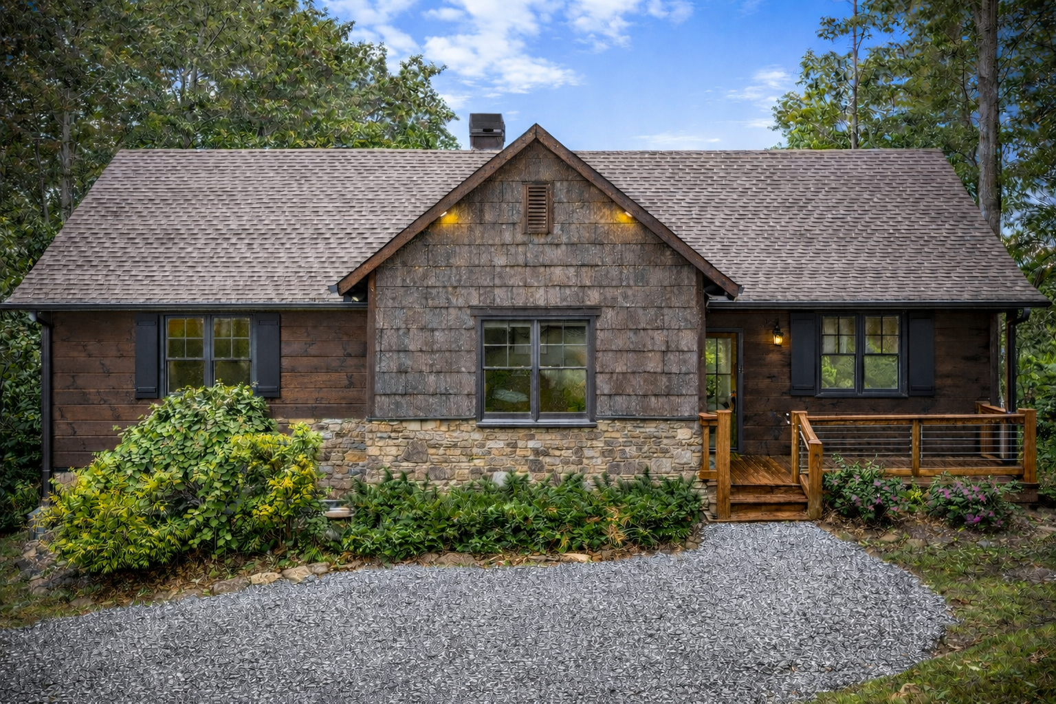 Front exterior of the cabin with stone and wood facade