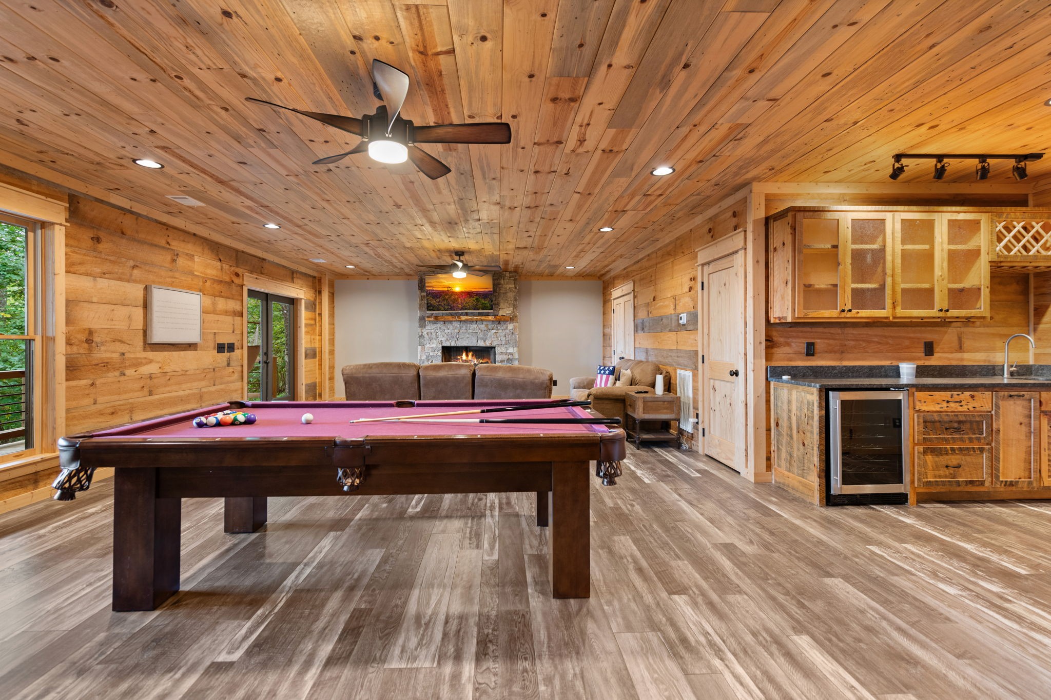 Game room with pool table and wet bar