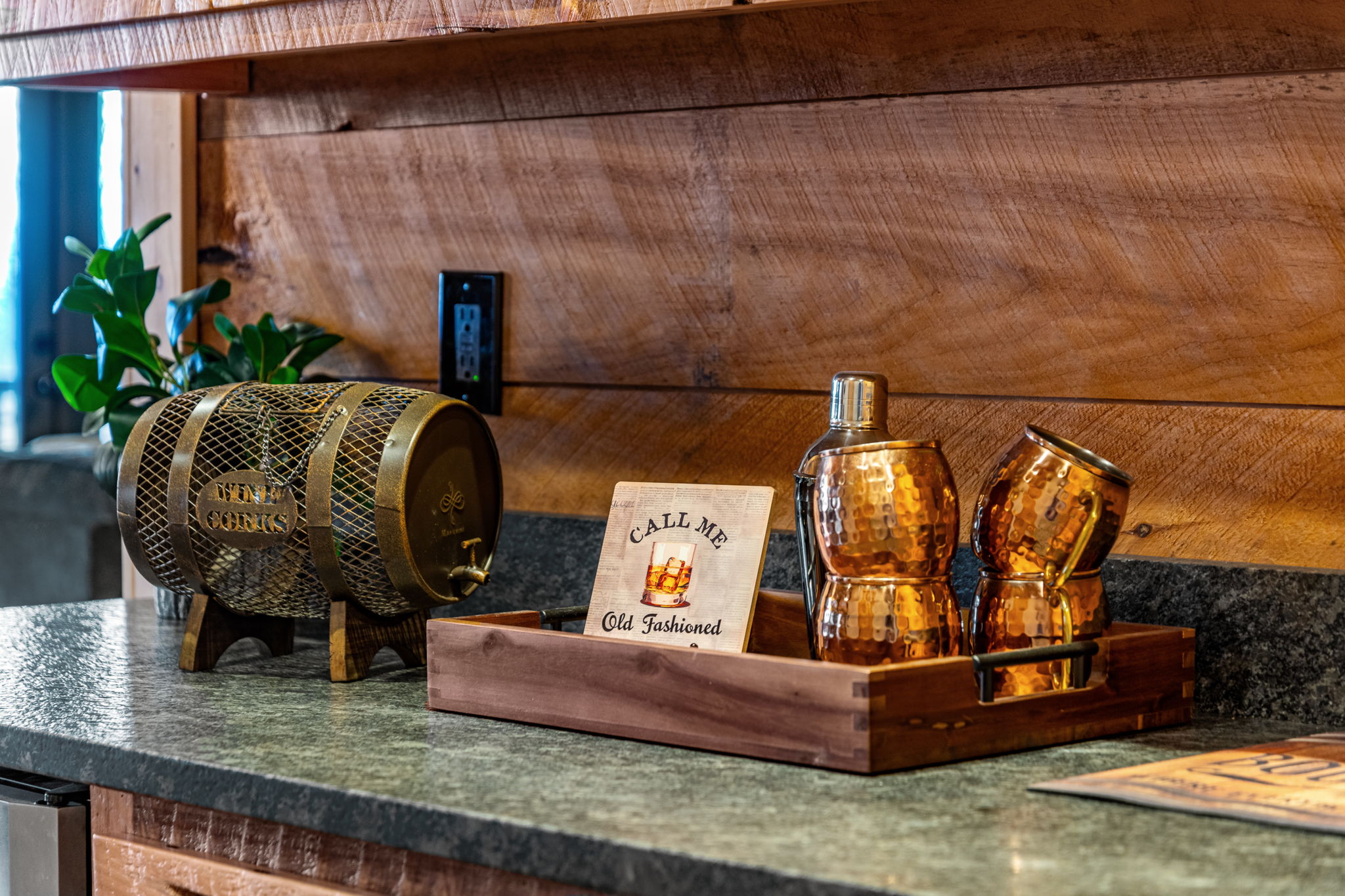 Bar detail with copper mugs and Old Fashioned sign